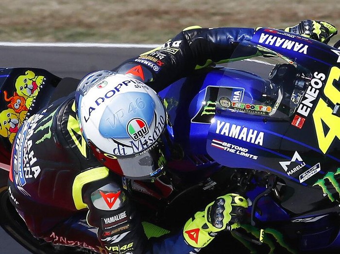 MotoGP rider Valentino Rossi of Italy takes a curve during the San Marino Motorcycle Grand Prix at the Misano circuit in Misano Adriatico, Italy, Sunday, Sept. 13, 2020. (AP Photo/Antonio Calanni)