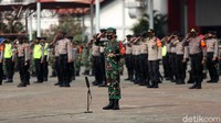 Sejumlah organisasi masyarakat (Ormas) mengikuti apel di JIExpo Kemayoran, Jakarta, Senin (14/9/2020).