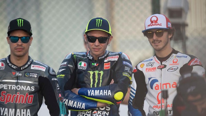 DOHA, QATAR - MARCH 07: (L-R) Franco Morbidelli of Italy and Petronas Yamaha SRT,  Valentino Rossi of Italy and Yamaha Factory Racing and Francesco Bagnaia of Italy and Alma Pramac Racing pose on track during MotoGP of Qatar - Previews at Losail Circuit on March 07, 2019 in Doha, Qatar. (Photo by Mirco Lazzari gp/Getty Images)