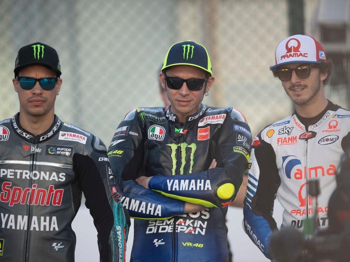 DOHA, QATAR - MARCH 07: (L-R) Franco Morbidelli of Italy and Petronas Yamaha SRT,  Valentino Rossi of Italy and Yamaha Factory Racing and Francesco Bagnaia of Italy and Alma Pramac Racing pose on track during MotoGP of Qatar - Previews at Losail Circuit on March 07, 2019 in Doha, Qatar. (Photo by Mirco Lazzari gp/Getty Images)