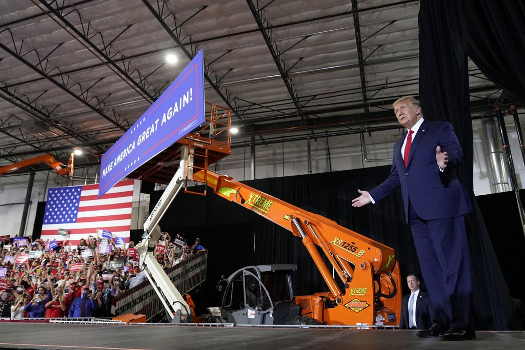 President Donald Trump arrives to speak at a rally at Xtreme Manufacturing, Sunday, Sept. 13, 2020, in Henderson, Nev. (AP Photo/Andrew Harnik)