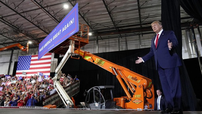President Donald Trump arrives to speak at a rally at Xtreme Manufacturing, Sunday, Sept. 13, 2020, in Henderson, Nev. (AP Photo/Andrew Harnik)