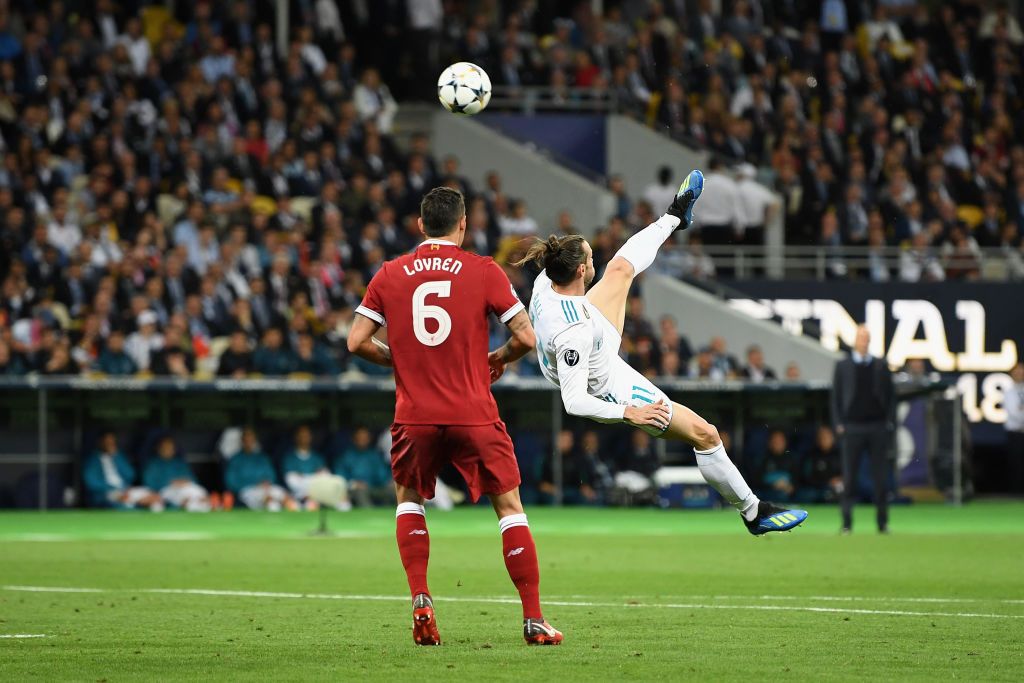 Gareth Bale KIEV, UKRAINE - MAY 26: Gareth Bale of Real Madrid celebrates scoring his side's second goal during the UEFA Champions League Final between Real Madrid and Liverpool at NSC Olimpiyskiy Stadium on May 26, 2018 in Kiev, Ukraine. (Photo by Michael Regan/Getty Images)
