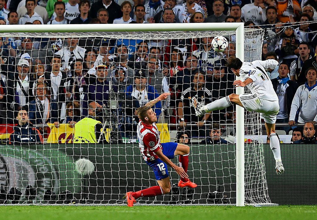 Gareth Bale KIEV, UKRAINE - MAY 26: Gareth Bale of Real Madrid celebrates scoring his side's second goal during the UEFA Champions League Final between Real Madrid and Liverpool at NSC Olimpiyskiy Stadium on May 26, 2018 in Kiev, Ukraine. (Photo by Michael Regan/Getty Images)