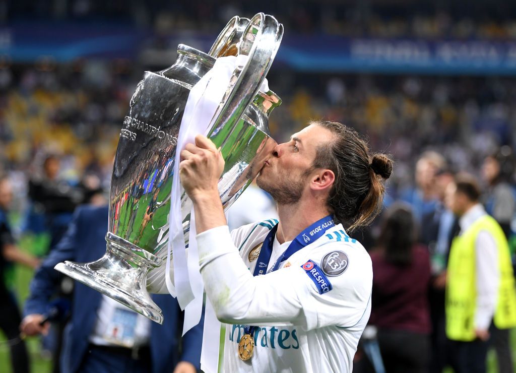 Gareth Bale KIEV, UKRAINE - MAY 26: Gareth Bale of Real Madrid celebrates scoring his side's second goal during the UEFA Champions League Final between Real Madrid and Liverpool at NSC Olimpiyskiy Stadium on May 26, 2018 in Kiev, Ukraine. (Photo by Michael Regan/Getty Images)