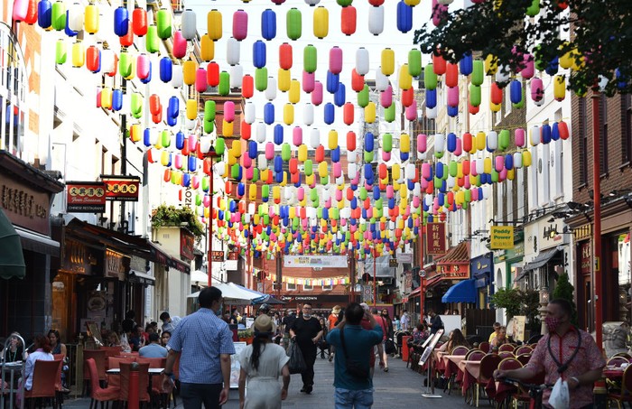 LONDON, ENGLAND - SEPTEMBER 15: A general view of the thousands of new, multi-coloured lanterns transforming the sky in Chinatown on September 15, 2020 in London, England. Chinatown London has partnered with the London Chinatown Chinese Association (LCCA) to replace the area's trademark red lanterns with thousands of special multi-coloured lanterns. The rows of bold and bright rainbow-hued lanterns throughout the streets of Chinatown are part of the #LoveChinatown campaign, to support the community of Chinatown business-owners and safely welcome people back to the area. The rainbow is also a nod to the amazing work of all the key workers that have supported the UK throughout the pandemic. (Photo by Stuart C. Wilson/Getty Images for Chinatown London)
