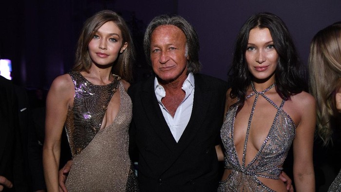 PARIS, FRANCE - NOVEMBER 30:  (L-R) Gigi Hadid, Mohamed Hadid and Bella Hadid attend the Victorias Secret After Party at the Grand Palais on November 30, 2016 in Paris, France.  (Photo by Dimitrios Kambouris/Getty Images for Victorias Secret)