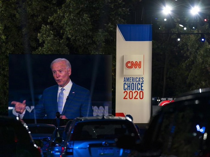 Democratic presidential candidate former Vice President Joe Biden ]is seen on a video screen as he participates in a CNN town hall moderated by Anderson Cooper in Moosic, Pa., Thursday, Sept. 17, 2020. (AP Photo/Carolyn Kaster)