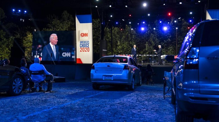 Democratic presidential candidate former Vice President Joe Biden ]is seen on a video screen as he participates in a CNN town hall moderated by Anderson Cooper in Moosic, Pa., Thursday, Sept. 17, 2020. (AP Photo/Carolyn Kaster)