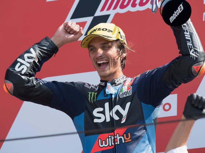 MISANO ADRIATICO, ITALY - SEPTEMBER 13: Luca Marini of Italy and Sky Racing Team VR46  celebrates the victory on the podium at the end of the Moto2 race during the MotoGP Of San Marino - Race at Misano World Circuit on September 13, 2020 in Misano Adriatico, Italy. (Photo by Mirco Lazzari gp/Getty Images)