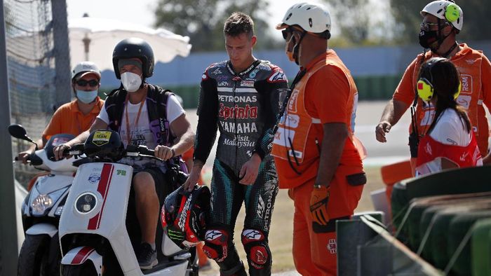 Fabio Quartararo MotoGP rider Fabio Quartararo of France walks away from the track after crashing during the San Marino Motorcycle Grand Prix at the Misano circuit in Misano Adriatico, Italy, Sunday, Sept. 13, 2020. (AP Photo/Antonio Calanni)