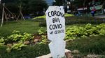 Kuburan Corona, Ingatkan Bahaya COVID-19