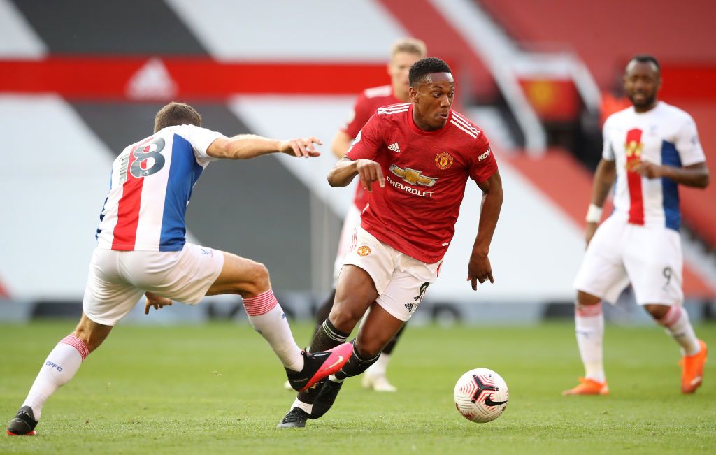 Manchester United vs Crystal Palace MANCHESTER, ENGLAND - SEPTEMBER 19: Anthony Martial of Manchester United takes on James McArthur of Crystal Palace during the Premier League match between Manchester United and Crystal Palace at Old Trafford on September 19, 2020 in Manchester, England. (Photo by Martin Rickett - Pool/Getty Images)