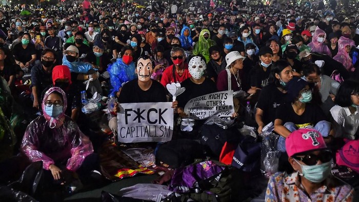 Anti-government protesters take part in a pro-democracy rally in Bangkok on September 19, 2020. - Tens of thousands of pro-democracy protesters massed close to Thailands royal palace on September 19, in a huge rally calling for PM Prayut Chan-O-Cha to step down and demanding reforms to the monarchy. (Photo by Vivek Prakash / AFP)