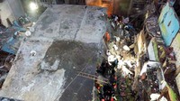 Penyebab insiden ini belum diketahui, tetapi bangunan runtuh sering terjadi selama musim hujan pada Juni-September di India. National Disaster Response Force via AP.