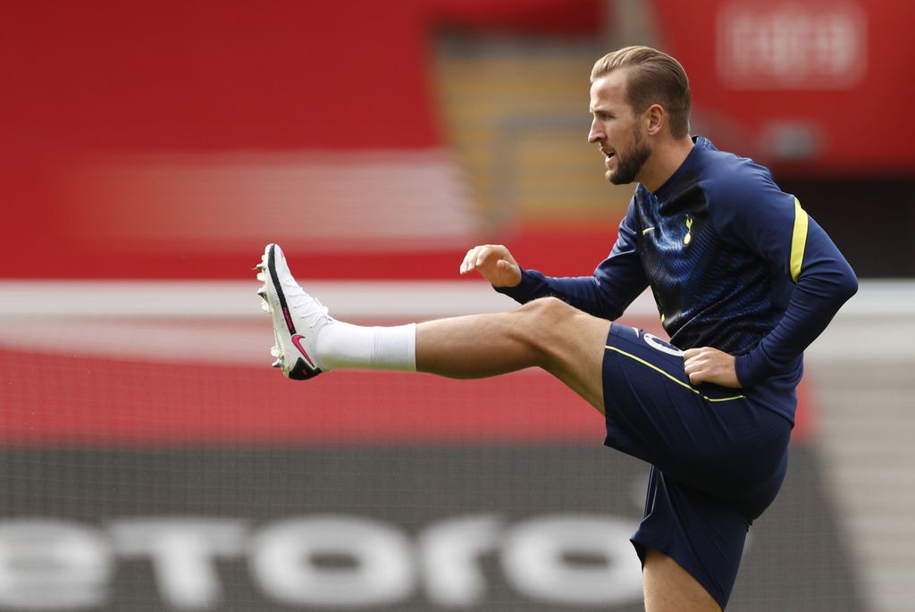 Tottenham's Harry Kane stretches himself during warmup before the English Premier League soccer match between Southampton and Tottenham Hotspur at St. Mary's Stadium in Southampton, England, Sunday, Sept. 20, 2020. (Andrew Boyers/Pool via AP)