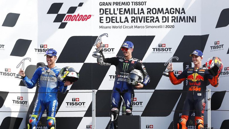 Maverick Vinales, MotoGP Emilia Romagna 2020 Second placed Joan Mir, winner Maverick Vinales and third placed Pol Espargaro, al three of Spain, pose on the podium of the MotoGP race of the Emilia Romagna Motorcycle Grand Prix at the Misano circuit in Misano Adriatico, Italy, Sunday, Sept. 20, 2020. (AP Photo/Antonio Calanni)