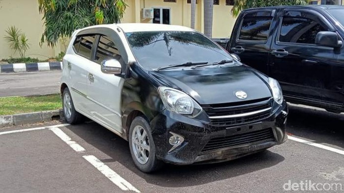 Mobil korban yang diamankan polisi di Mapolda Sumsel.