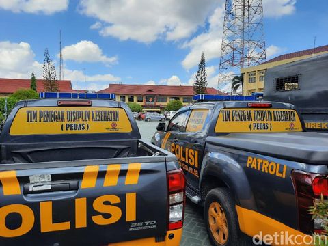 Polda Kalsel terjunkan Tim Pedas dalam mendukung Operasi Yustisi untuk penegakan protokol kesehatan (M Risanta/detikcom)
