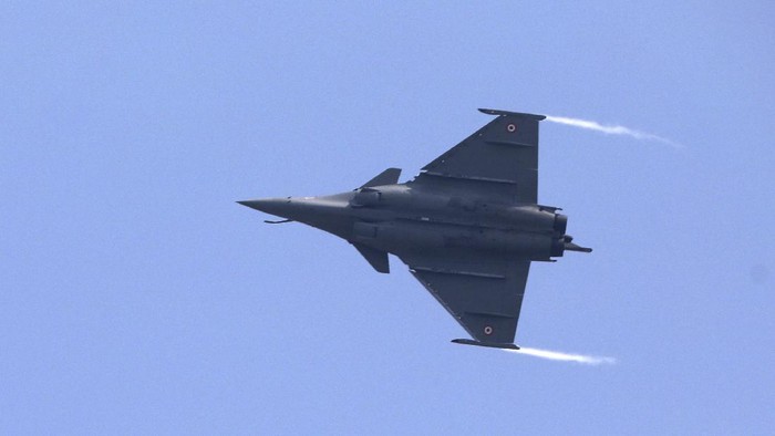 A French-made Rafale fighter jet flies during its induction ceremony at the Indian Air Force Station in Ambala, India, Thursday, Sept.10, 2020. The first batch of five planes, part of a $8.78 billion deal signed between the two countries in 2016 had arrived here in July. (AP Photo/Manish Swarup)