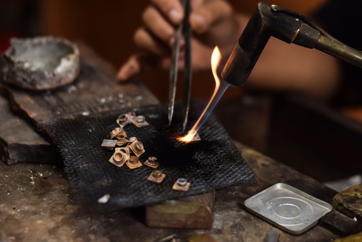 A man is making wooden crafts  in Indonesia