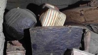 Para ahli mengatakan peti mati itu belum dibuka sejak dikuburkan. Ministry of Tourism and Antiquities via AP.