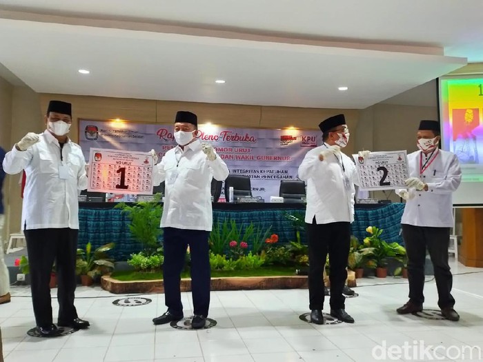Dua paslon di Pilgub Kalsel: Sahbirin Noor–H Muhidin dan Denny Indrayana-Difriadi Darjad (Risanta/detikcom)