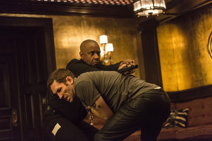 McCall (DENZEL WASHINGTON) takes out one of Slavis thugs (NASH EDGERTON) in Columbia Pictures THE EQUALIZER.