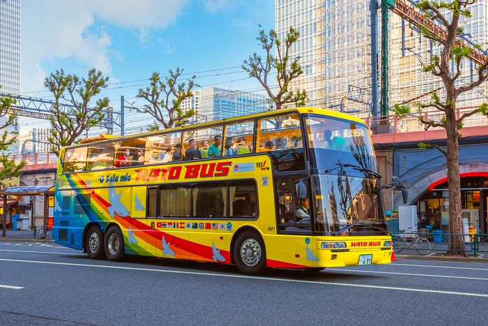 Tokyo, Japan - April 28 2018: Hato Bus goes around the Tokyo sightseeing spots with both English and Chinese speaking guide, its one of the best ways to enjoy  Tokyo citys surrounding
