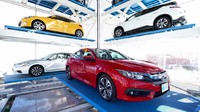 Carvana co sudah memulai bisnisnya di Amerika Serikat sejak lama. Namun baru belakangan ini mereka meraup untung luar biasa besar dari jualan mobil bekas pakai vending machine. Foto: Youtube: Carvana