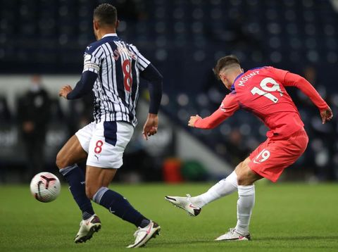 Mason Mount WEST BROMWICH, ENGLAND - SEPTEMBER 26: Mason Mount of Chelsea scores his sides first goal during the Premier League match between West Bromwich Albion and Chelsea at The Hawthorns on September 26, 2020 in West Bromwich, England. Sporting stadiums around the UK remain under strict restrictions due to the Coronavirus Pandemic as Government social distancing laws prohibit fans inside venues resulting in games being played behind closed doors. (Photo by Nick Potts - Pool/Getty Images)