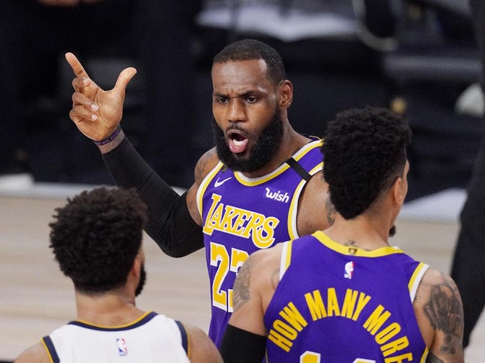 Los Angeles Lakers LeBron James (23) voices his opinion after a play in the second half of an NBA conference final playoff basketball game against the Denver Nuggets Saturday, Sept. 26, 2020, in Lake Buena Vista, Fla. (AP Photo/Mark J. Terrill)