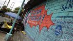 Lewat Mural, Warga Yogya Ajak Lawan COVID-19