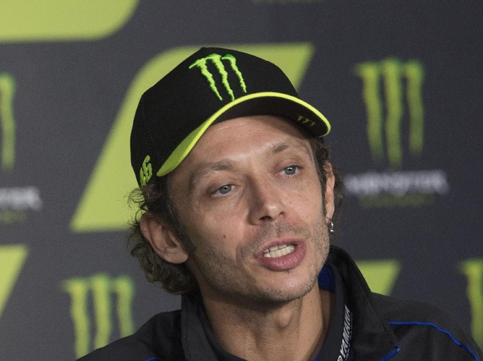 BARCELONA, SPAIN - SEPTEMBER 26: Valentino Rossi of Italy and Monster Energy Yamaha MotoGP Team speaks during the 