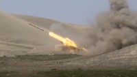 Pertempuran antara pasukan Armenia dengan Azerbaijan di Nagorny Karabakh memasuki hari kedua. Perang ini dilatarbelakangi oleh perebutan daerah perbatasan Nagorny Karabakh. Azerbaijans Defense Ministry via AP.