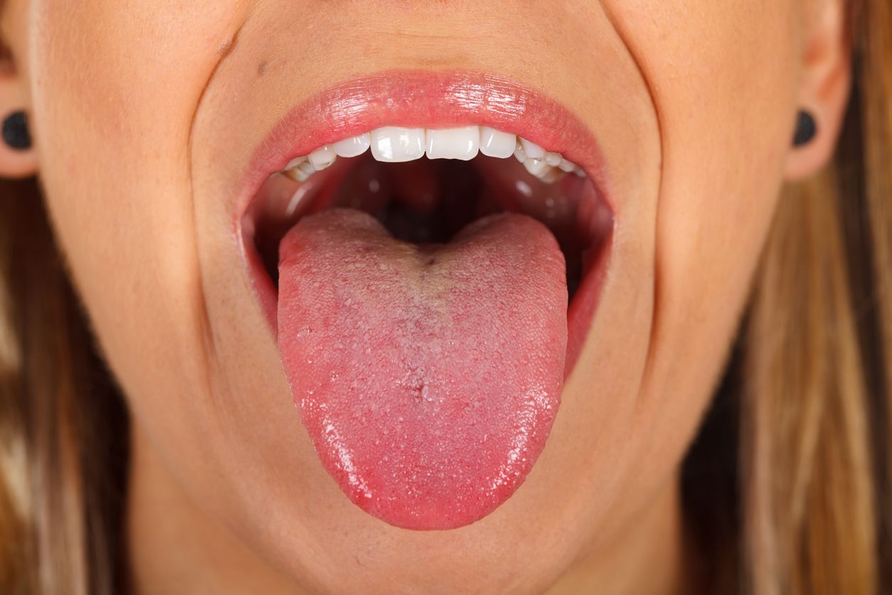 Close up picture of a woman's tongue