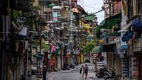 Secara tahunan ekonomi Vietnam masih tumbuh 0,39%. Ekonominya terus tumbuh berkat kegiatan ekspor yang masih berjalan, terutama suku cadang elektronik, baja, dan produk industri lainnya. Linh Pham/Getty Images