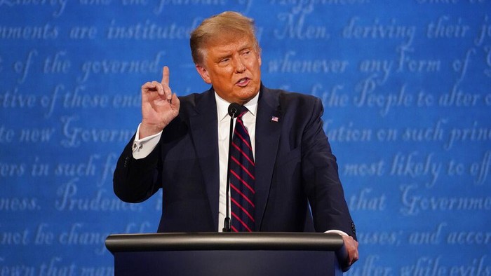 President Donald Trump gestures while speaking during the first presidential debate Tuesday, Sept. 29, 2020, at Case Western University and Cleveland Clinic, in Cleveland, Ohio. (AP Photo/Julio Cortez)