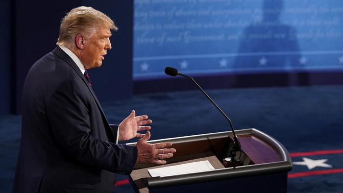 President Donald Trump answers a question during the first presidential debate Tuesday, Sept. 29, 2020, at Case Western University and Cleveland Clinic, in Cleveland, Ohio. (AP Photo/Morry Gash, Pool)