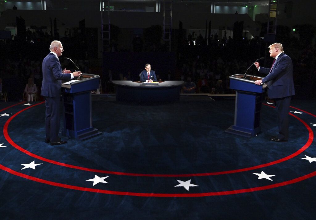 President Donald Trump and Democratic presidential candidate former Vice President Joe Biden participate in the first presidential debate Tuesday, Sept. 29, 2020, at Case Western University and Cleveland Clinic, in Cleveland. (Olivier Douliery/Pool vi AP)