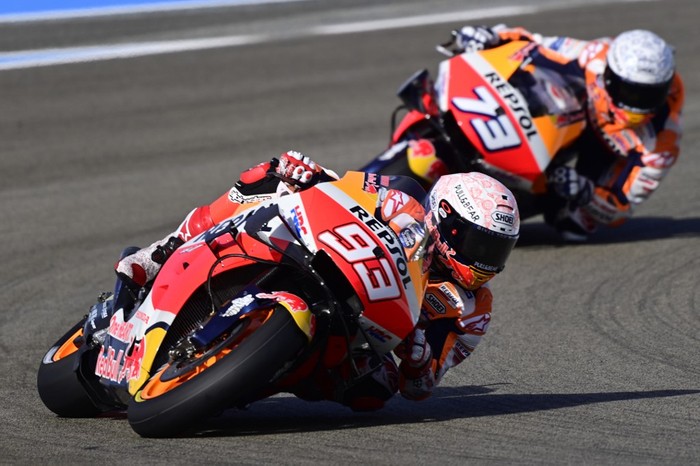 Repsol Honda Teams Spanish rider Marc Marquez rides ahead of his brother, Repsol Honda Teams Spanish rider Alex Marquez, during the first MotoGP free practice session of the Spanish Grand Prix at the Jerez racetrack in Jerez de la Frontera on July 17, 2020. (Photo by JAVIER SORIANO / AFP)