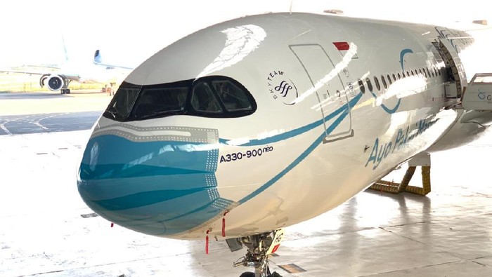 Pesawat Garuda Pakai Masker