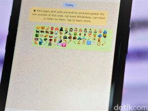 Apple Rilis Emoji Tersenyum Pakai Masker