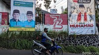 Spanduk Benyamin Davnie-Pilar Saga Ichsan dan Haji Muhamad terpampang di kawasan Tengarang Selatan, Sabtu (3/10/2020).