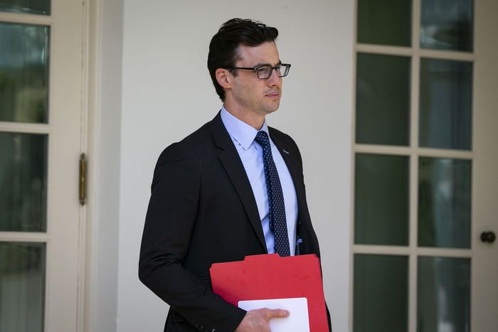 Nicholas Luna, deputy assistant and personal aide to U.S. President Donald Trump, waits in the Rose Garden of the White House in Washington, D.C., U.S., on Wednesday, Oct. 2, 2019. Trump said he would discuss trade and military purchases with Finlands President Sauli Niinisto. Photographer: Al Drago/Bloomberg via Getty Images