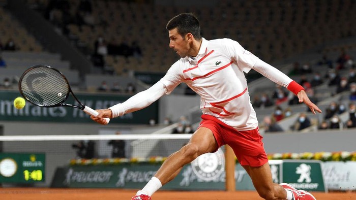 PARIS, FRANCE - OCTOBER 03: Novak Djokovic of Serbia plays a backhand during his Mens Singles third round match against Daniel Elahi Galan of Colombia on day seven of the 2020 French Open at Roland Garros on October 03, 2020 in Paris, France. (Photo by Shaun Botterill/Getty Images)