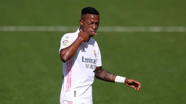 Vinicius Junior Real Madrid VILLAREAL, SPAIN - OCTOBER 04: Vinicius Junior of Real Madrid celebrates after he scores his sides first goal during the La Liga Santander match between Levante UD and Real Madrid at Ciutat de Valencia Stadium on October 04, 2020 in Valencia, Spain. Football Stadiums around Europe remain empty due to the Coronavirus Pandemic as Government social distancing laws prohibit fans inside venues resulting in fixtures being played behind closed doors. (Photo by Alex Caparros/Getty Images)
