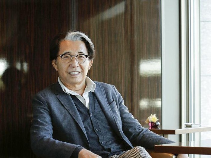Kenzo Takada Fashion designer Kenzo Takada poses for a photo in Tokyo in October, 2019. Takadas family said in a statement to French media Sunday, Oct. 4, 2020 that Takada died from complications from COVID-19 in a hospital in Neuilly-sur-Seine, near Paris. He was 81. (Kyodo News via AP)