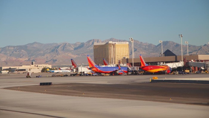 LAS VEGAS, NEVADA—APRIL 2017: View of the McCarran International Airport in Las Vegas Nevada, with the Mandalay Bay hotel and the Nevada mountains in the background.