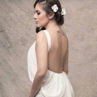 Wulan Guritno memiliki tato berbentuk bendera Indonesia dan Inggris. Tato tersebut menunjukkan bahwa Wulan memiliki darah Indonesia dan juga Inggris dalam dirinya. Foto: Instagram/wulanguritno